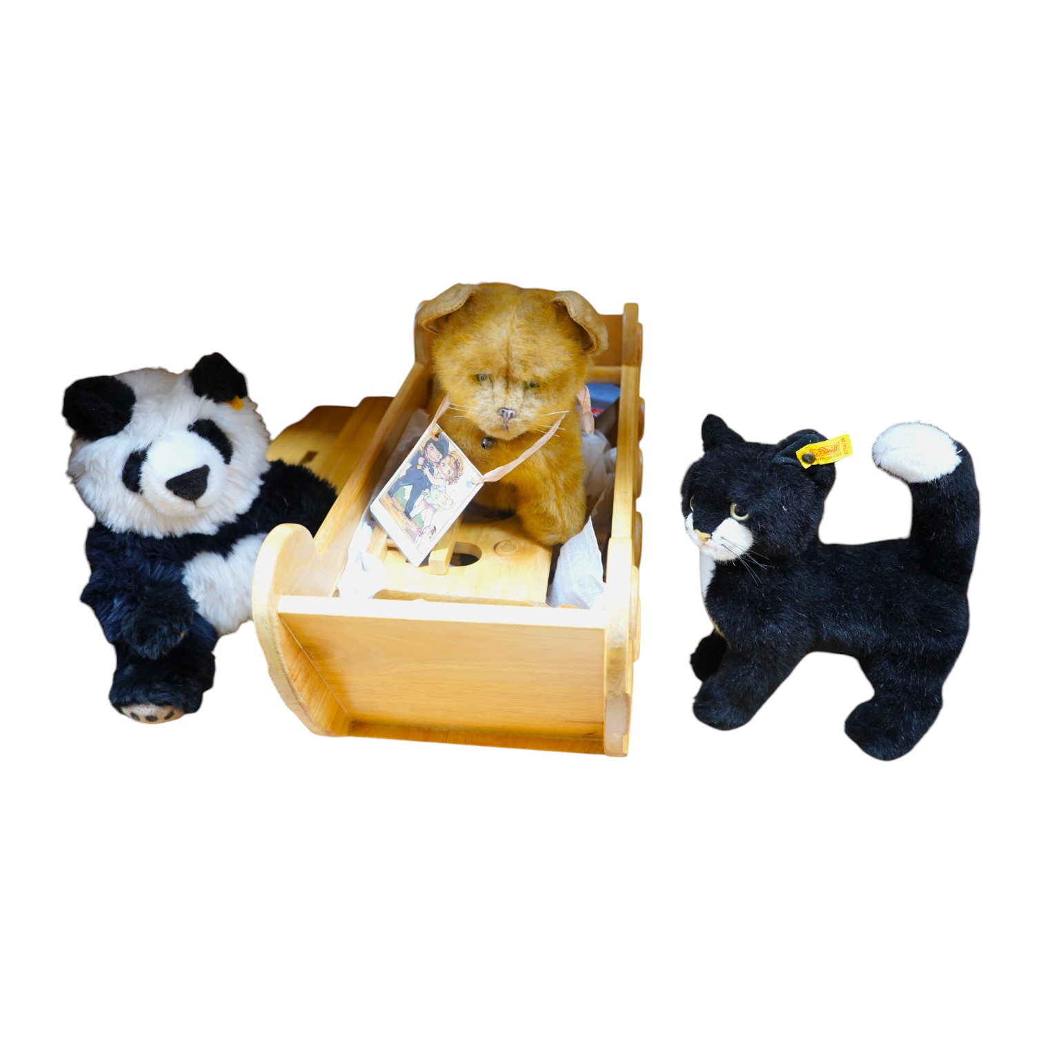 A modern Sri Lankan wood Noah's Ark and animals, a Steiff black cat and panda and another soft toy cat. Noah's Ark 54cm long. Condition - good